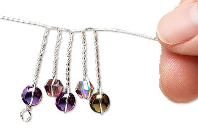 Twisted wire with beads